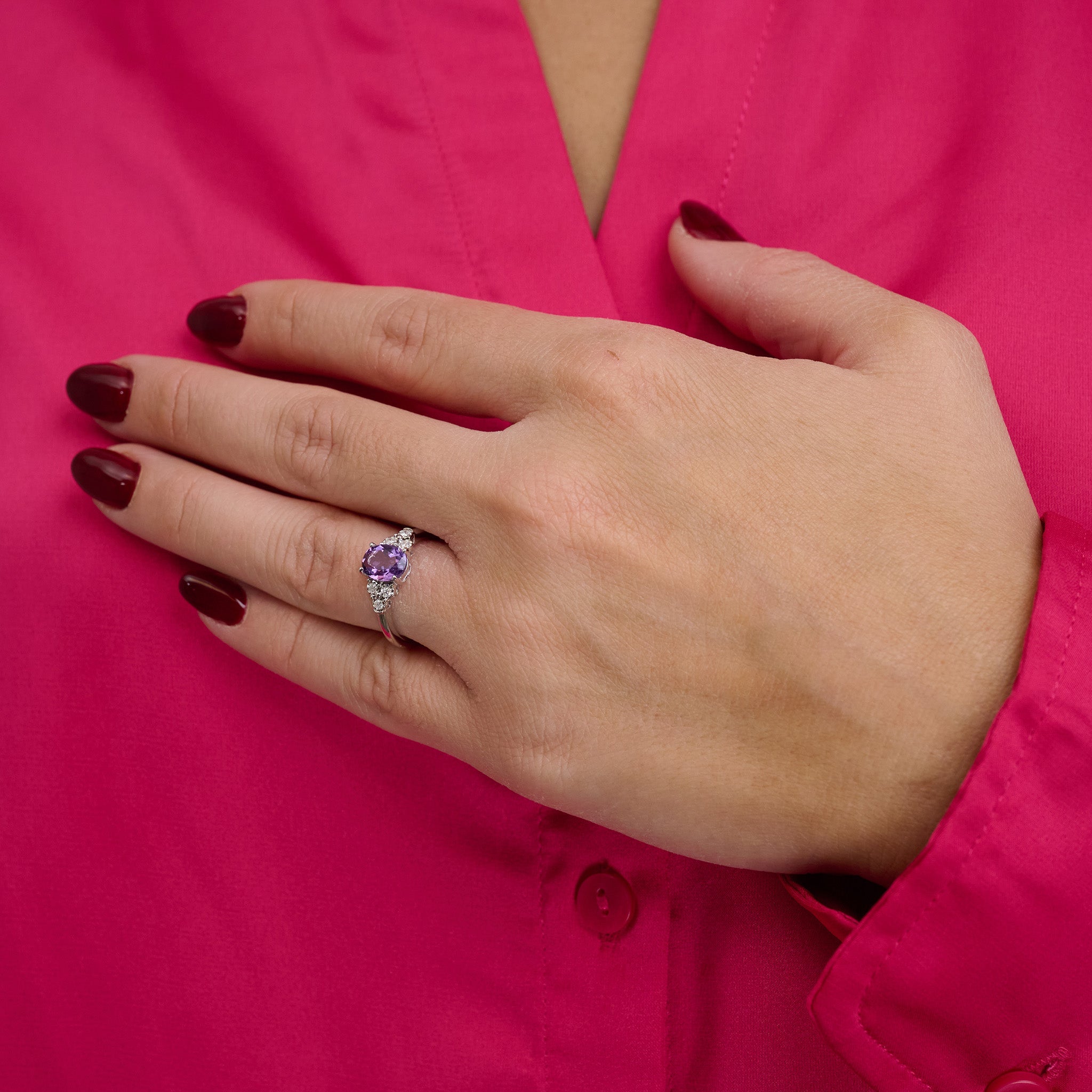 Oval Created Gemstone and Diamond Ring