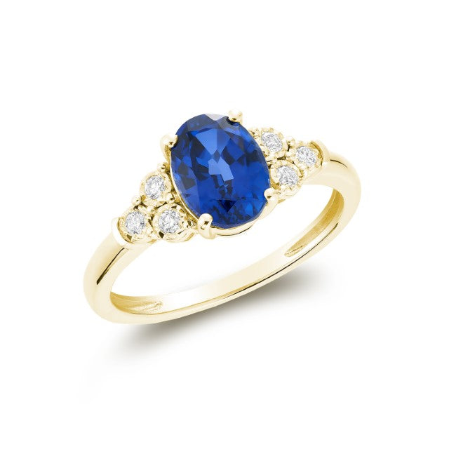 Oval Created Gemstone and Diamond Ring